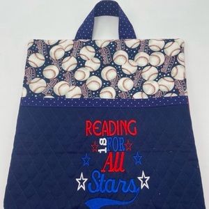 Reading Pillow with a front pocket for cuddling with a favorite book or tablet.